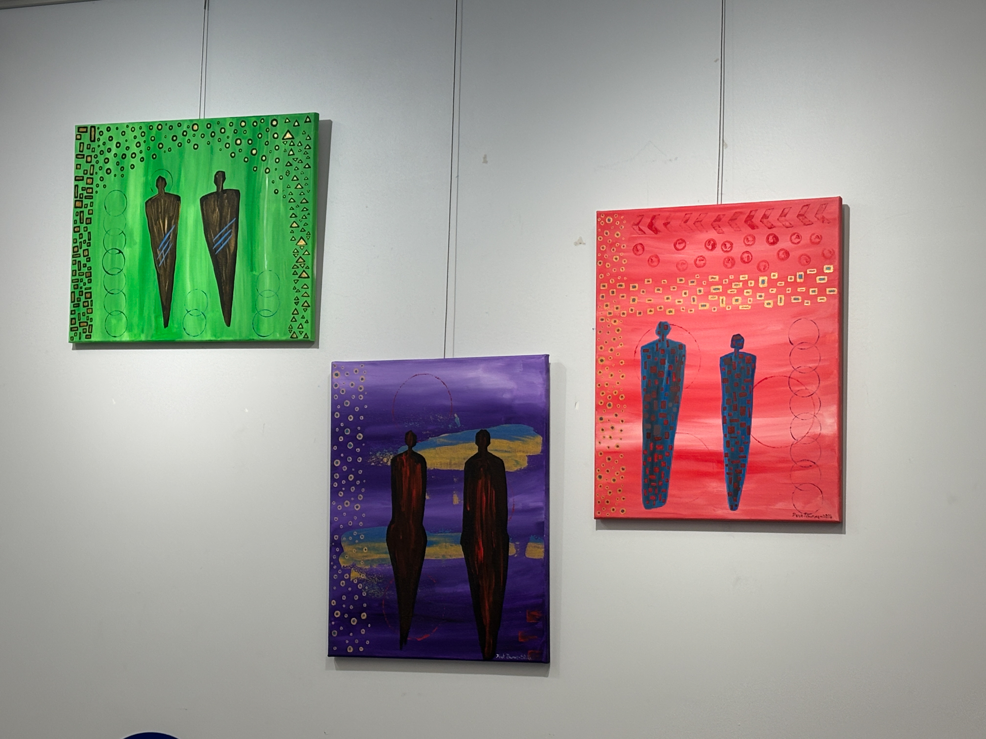 An image of artwork hanging on display.